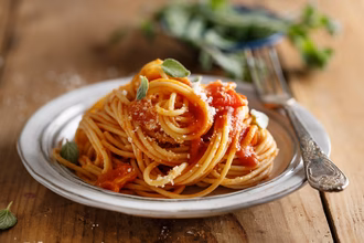 pasta-spaghetti-with-tomato-sauce-cheese-served-plate